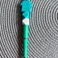 Teal scrub top pen