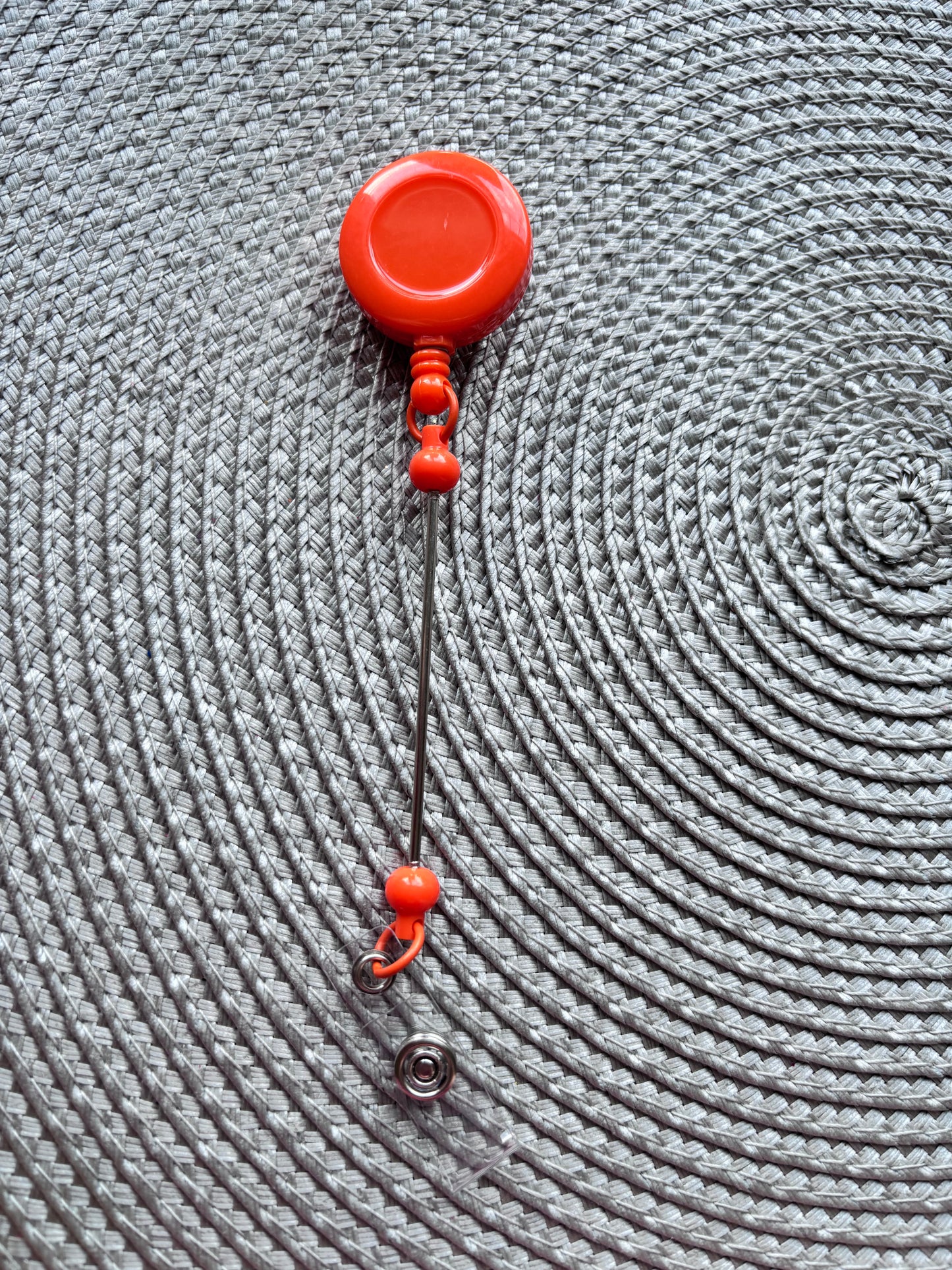 Orange beadable bar badge reel