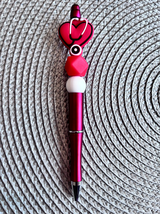 Red stethoscope heart pen