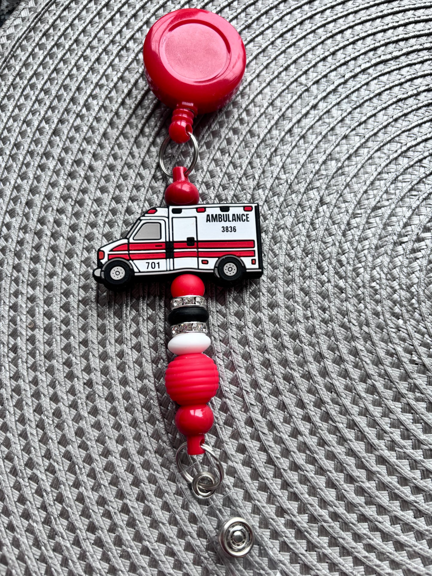 Ambulance badge reel