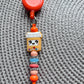 Happy pill bottle badge reel