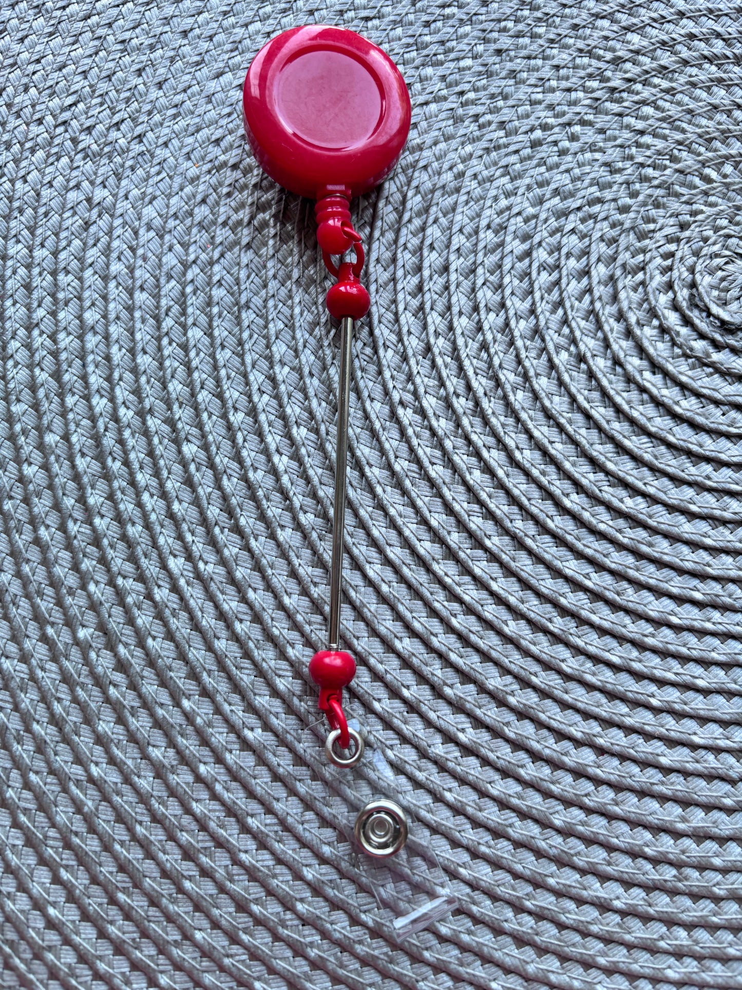 Red beadable badge reel