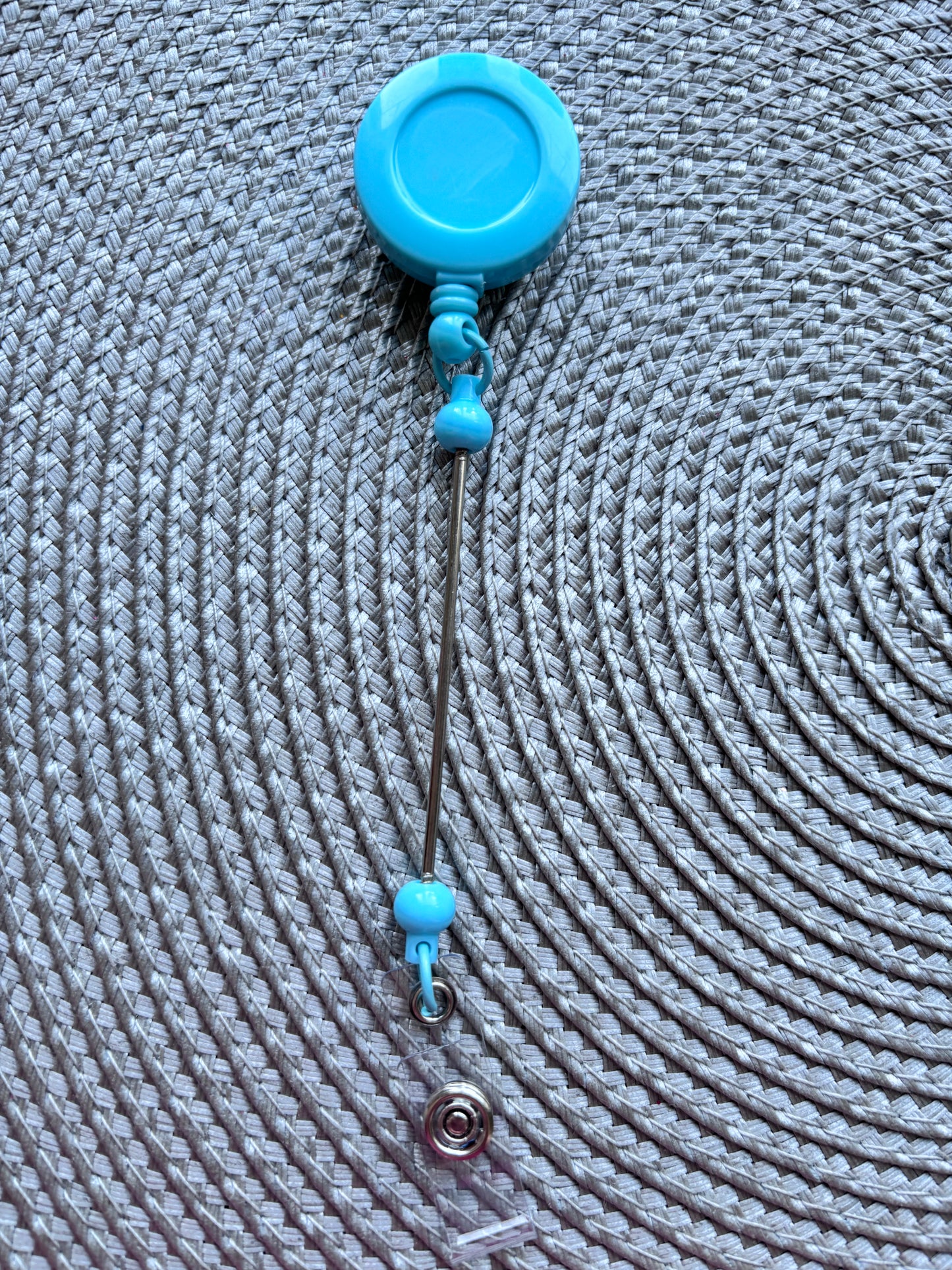 Light blue beadable bar badge reel