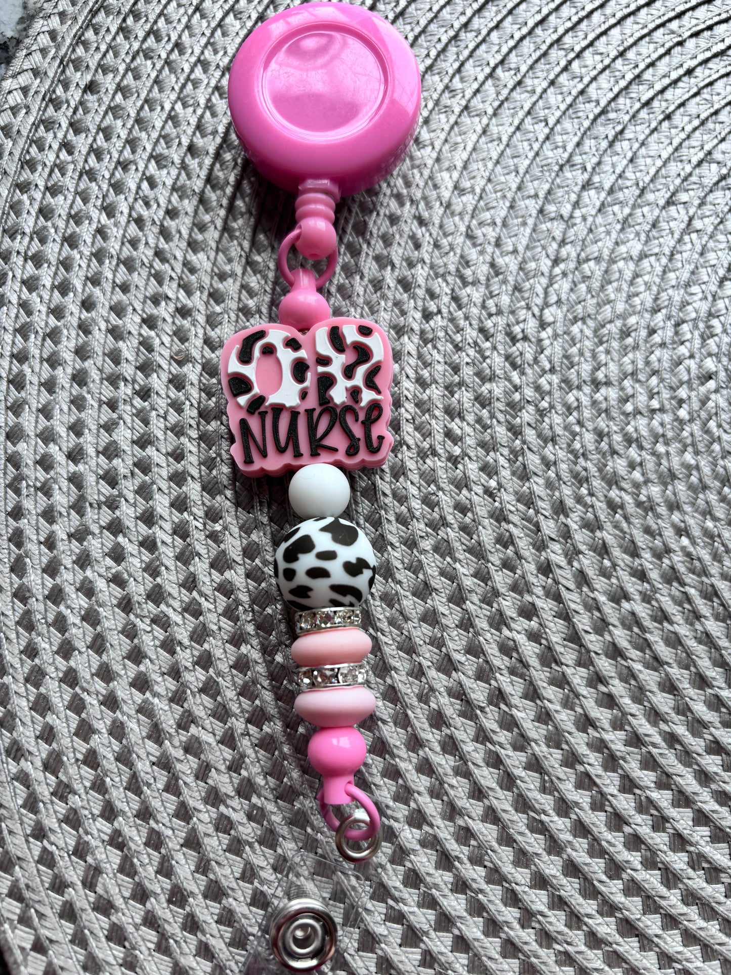 OR nurse cow print badge reel